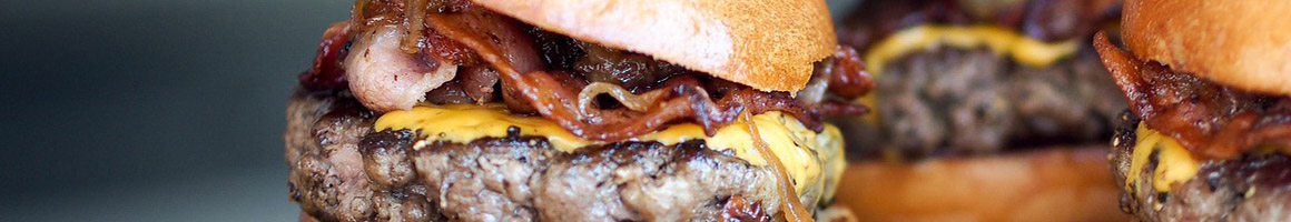 Eating Burger at Burgertown USA restaurant in Ontario, CA.